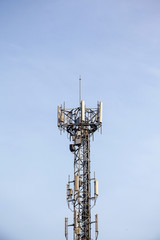 Close up communication tower top. Radio antenna Tower , microwave antenna tower on light sky background. wireless technology concept. communication development concept. image for objects and article.