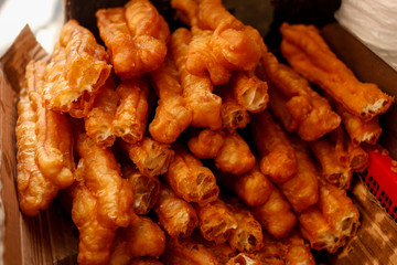 Deep-fried dough stick in macau China .