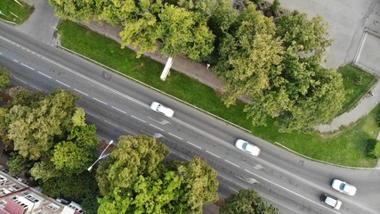 View on the road in the Krasnodar from the air. Road from height. Aerial view of the road and cars.
