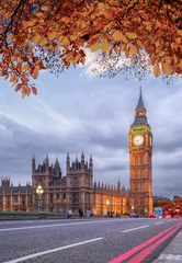 Tuinposter Buses with autumn leaves against Big Ben in London, England, UK © Tomas Marek