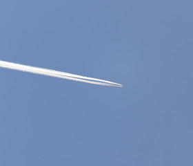 airplane with traces in the sky
