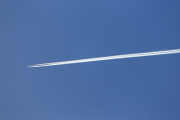 airplane with traces in the sky