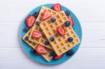 Belgian waffles with strawberry and blueberry