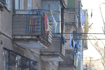 Fototapeta na wymiar balconies near old storey houses