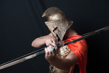 Customized model as a roman soldier in studio with black background