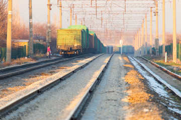 a man crossing a railway