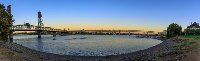 Fototapeta premium Sunset Over Portland Oregon City Skyline Along Willamette River Waterfront