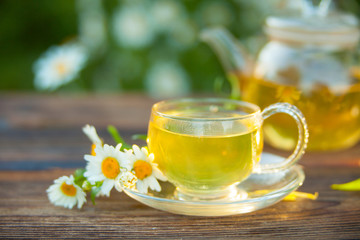 green tea with chamomile in cup