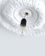 The old generation of light bulbs on the ceiling
