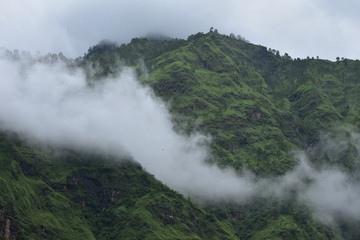 lush green mountains with clouds landscape  view