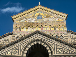 Obraz premium At the top of a staircase, Saint Andrew's Cathedral (Duomo) overlooks the Piazza Duomo, the heart of Amalfi. The cathedral dates back to the 11th century. The stairs were built in 1203 