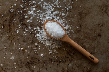 Sea Salt Flakes Spilled from a Teaspoon