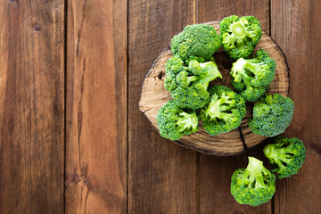 Broccoli. Fresh broccoli on wooden background