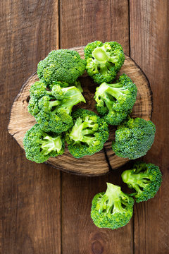 Broccoli. Fresh broccoli on wooden background
