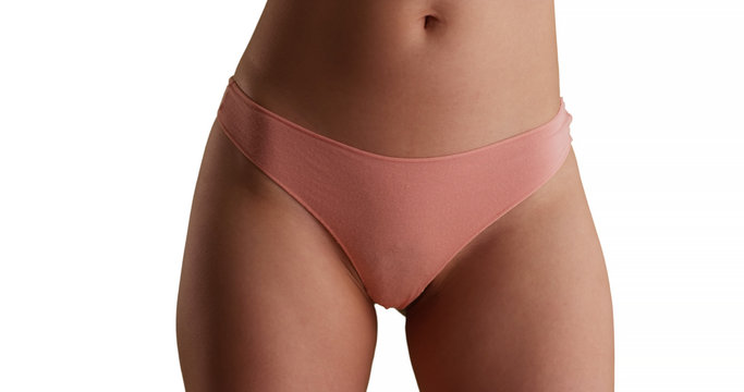 Close up of millennial woman wearing pink underwear for copy space