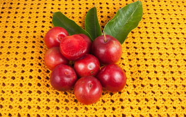 red plum on the wooden background