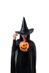 Portrait of woman in black Scary witch halloween costume standing with hat isolated on white background