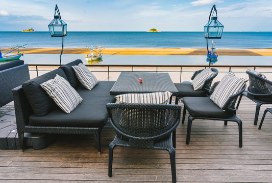 Beach lounge terrace with couple chair and table on sea view, Summer landscape