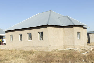 Unfinished house in the village