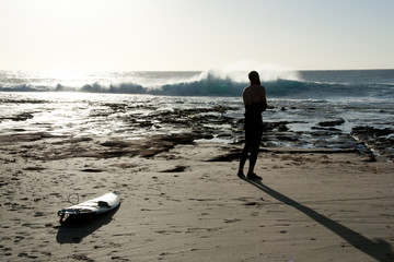 Surfer Silhouette in Ocean © Adwo