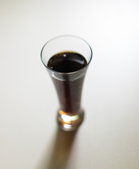 dark drink in a glass