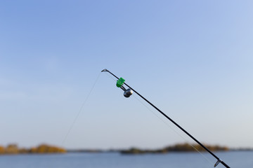 fishing rod on the river background