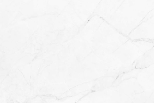 White marble with natural patterns. Use for design and background.