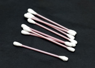 cotton swab on a black background