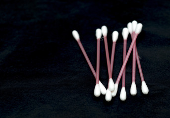 cotton swab on a black background