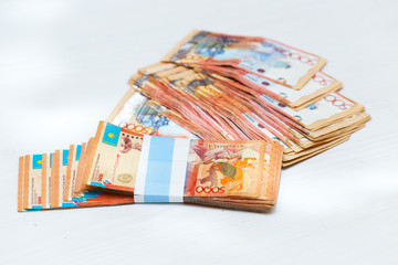 Kazakh banknotes on a white background