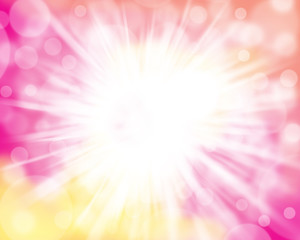 Colorful bokeh in pink, yellow, orange light with white sunray blurred background and smooth...