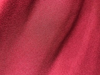 Fototapeta na wymiar Red Polyester clothing texture.