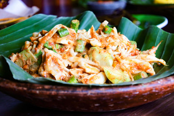 Karedok, typical indonesian traditional food made from fresh raw vegetables mixed with brown sugar chilli and peanut sauce