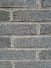 detail of an old concrete brick wall