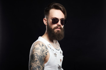 Fototapeta premium bearded hipster in vintage torn dirty shirt