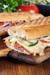 Toasted sandwiches with ham, cheese and other