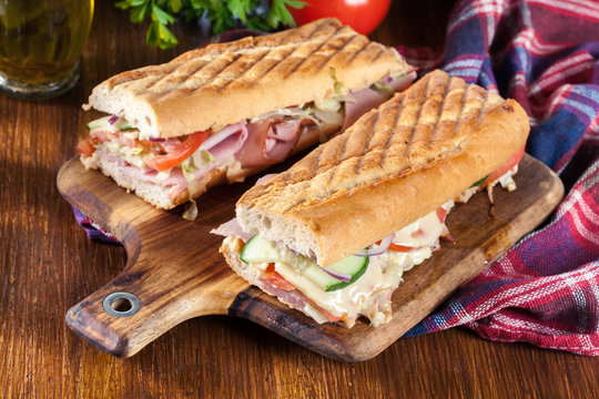 Toasted sandwiches with ham, cheese and other