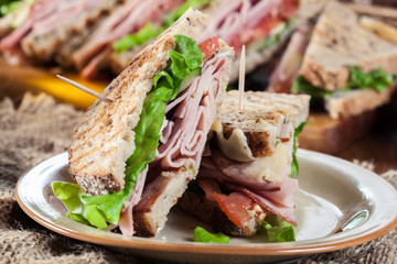 Toasted sandwiches with ham, cheese and other