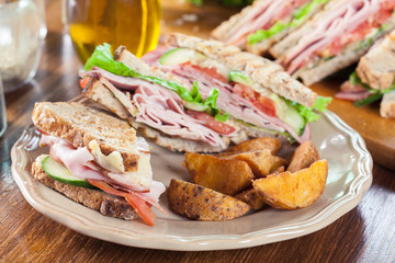 Toasted sandwiches with ham, cheese and other