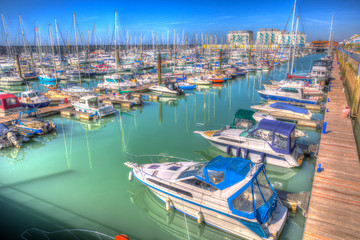 Obraz premium Brighton marina boats and yachts East Sussex England UK bright colourful HDR