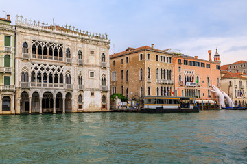 Fototapeta na wymiar Gondolas along Grand Canal of Venice Italy