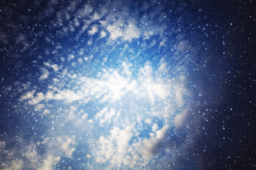Cloudy sky with stars
