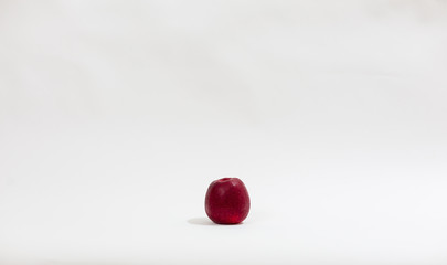 Red apples on white background