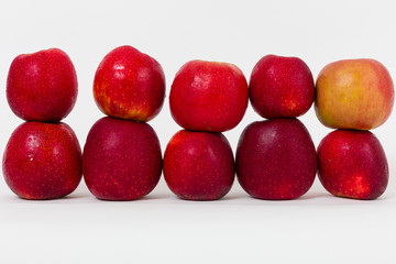 Red apples on white background