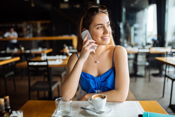 Beautiful woman talking on cell phone