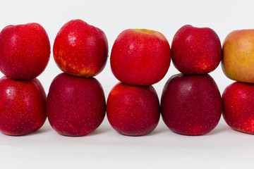 Red apples on the white background 