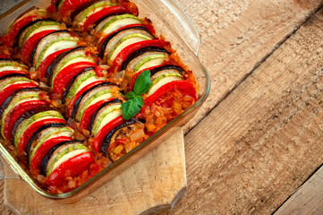 Ratatouille - Traditional Dish Of Provencal Cuisine. Healthy Vegetable Food. Wooden Background