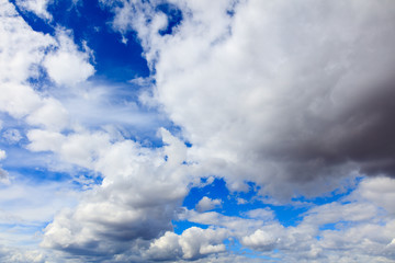 Clouds on a blue sky as a background