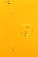 Soap bubbles on a golden background