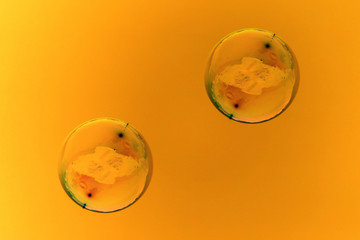 Soap bubbles on a golden background